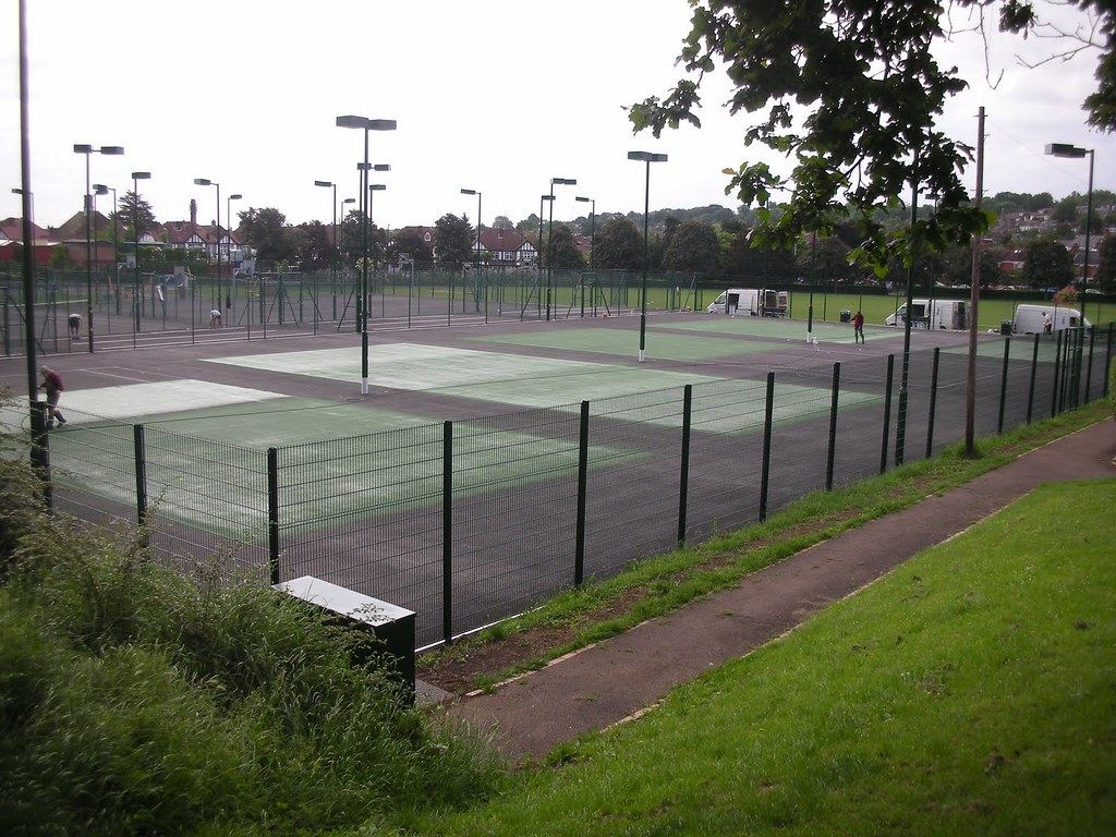 Floodlit tennis courts and the café terrace at Oliver Tambo Recreation Ground